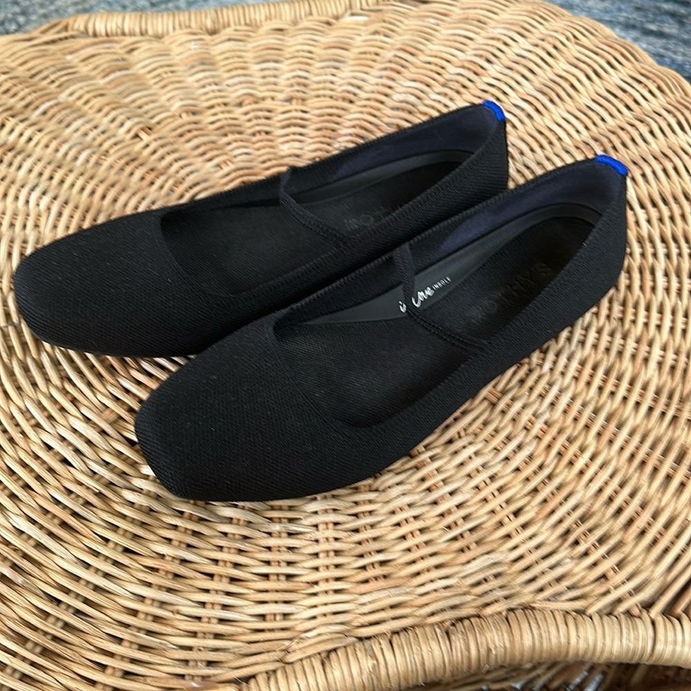 Rothy's Black Ballet Flats with Blue Heel Tab